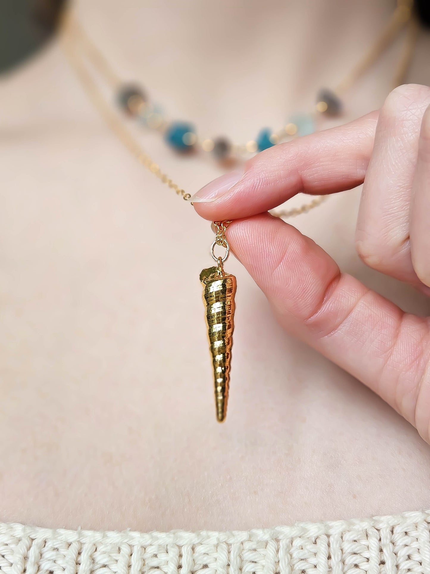 Petits coquillages dorés