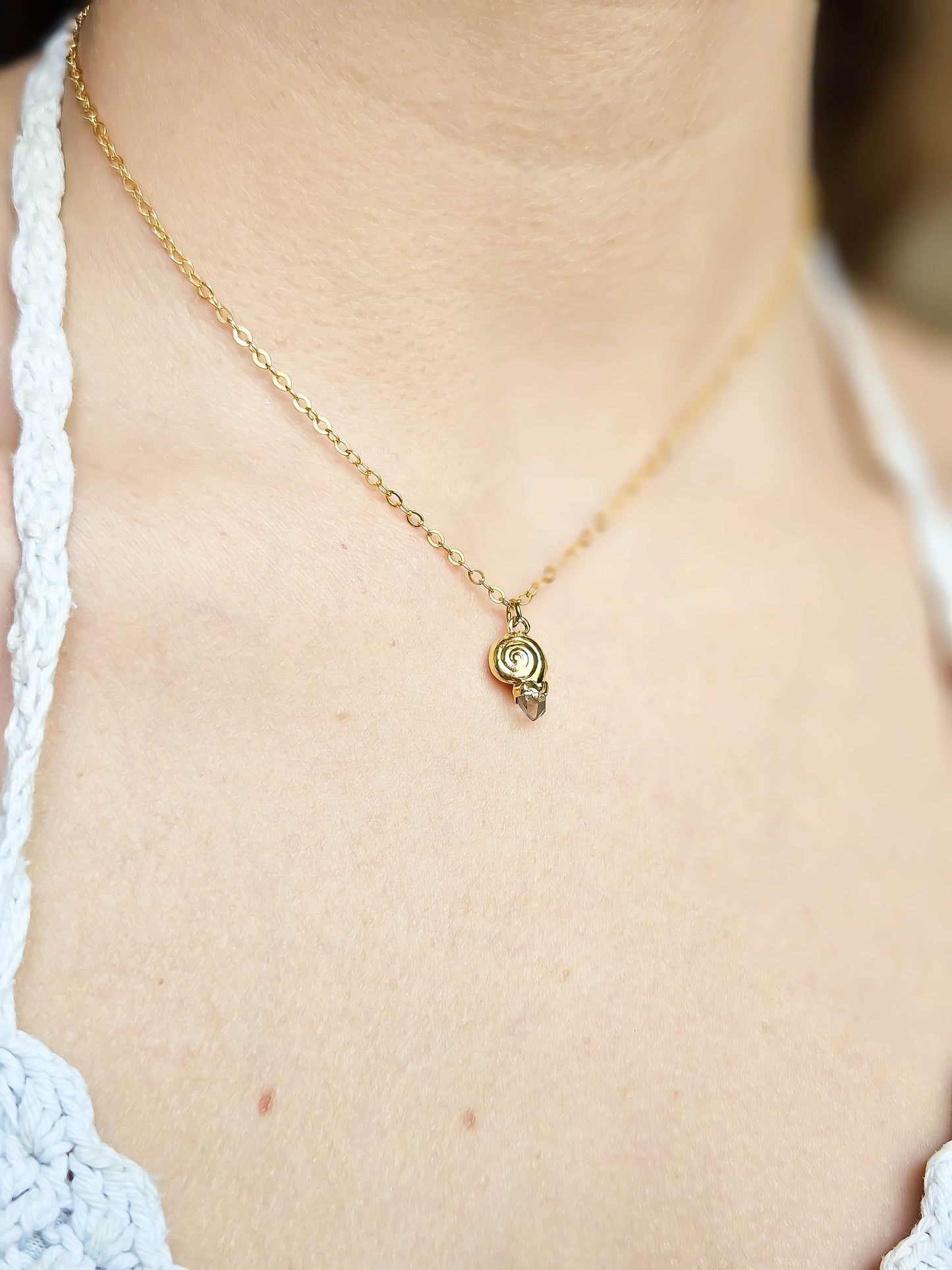 Collier coquillage, Or