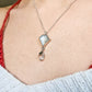 Collier argent pierre de lune blanche et pointe de quartz